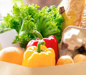 grocery bag containing vegetables